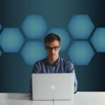 Businessman working on SEO at a laptop